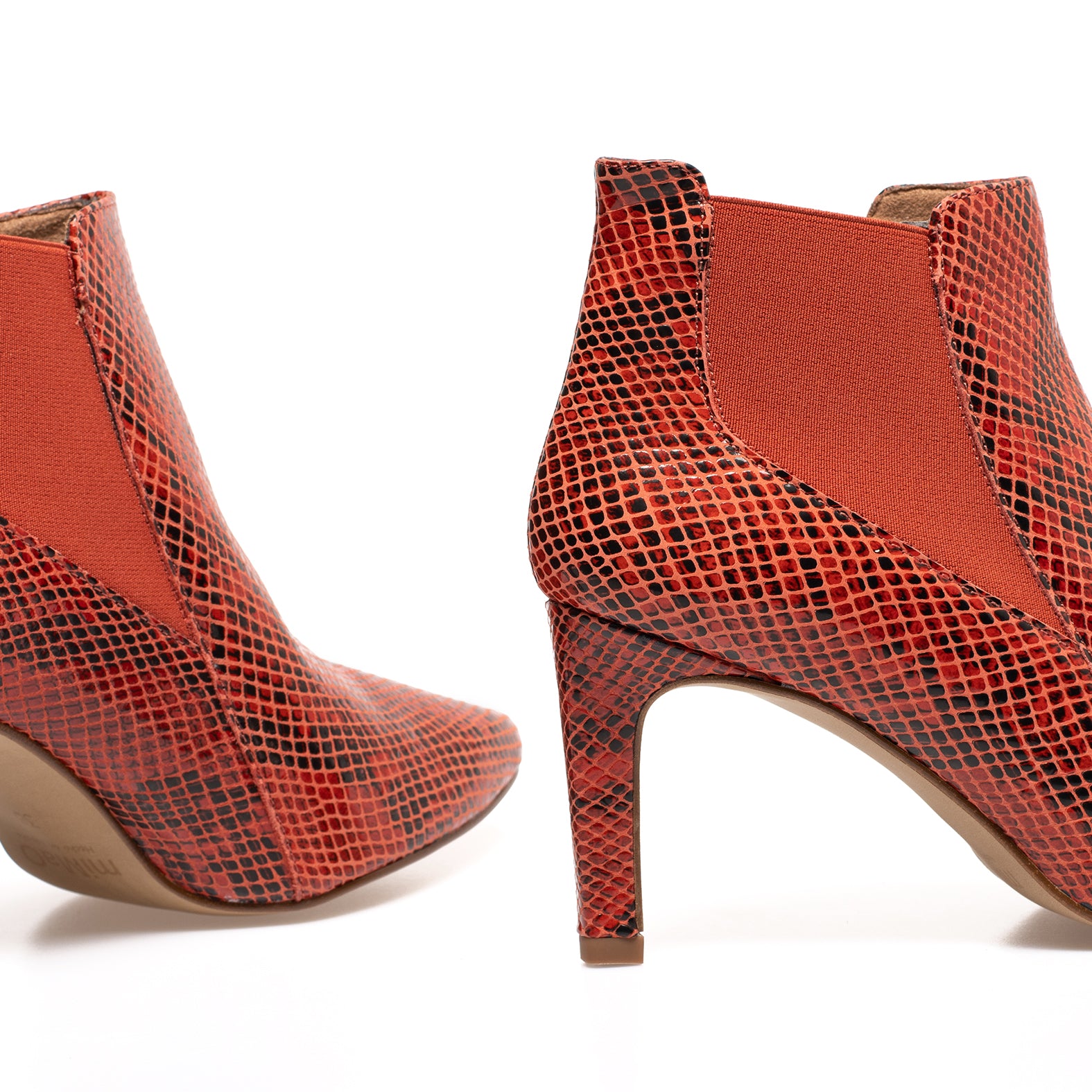 SAUVAGE Botín animal print tacón ROJO