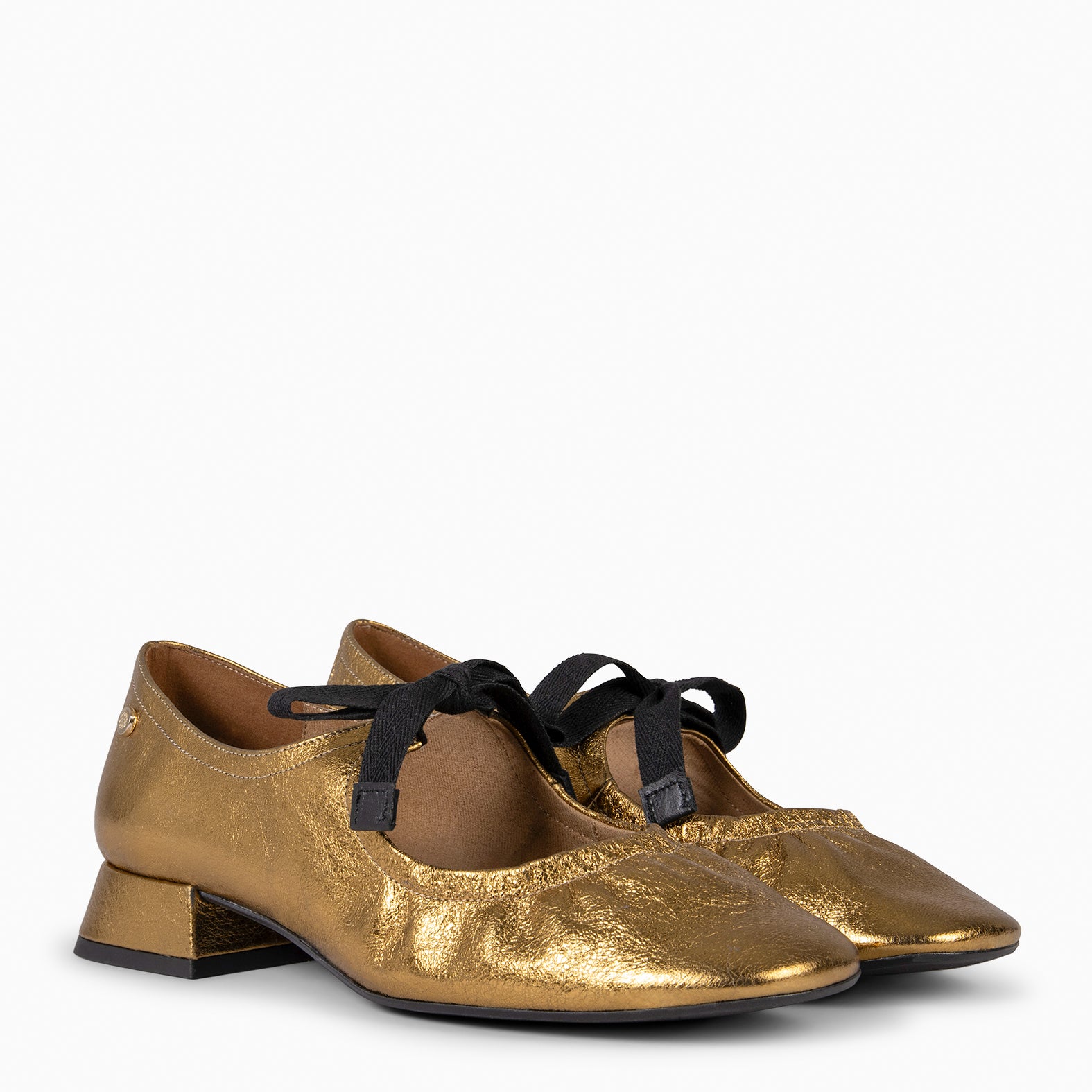 CORA – Merceditas con lazo BRONCE