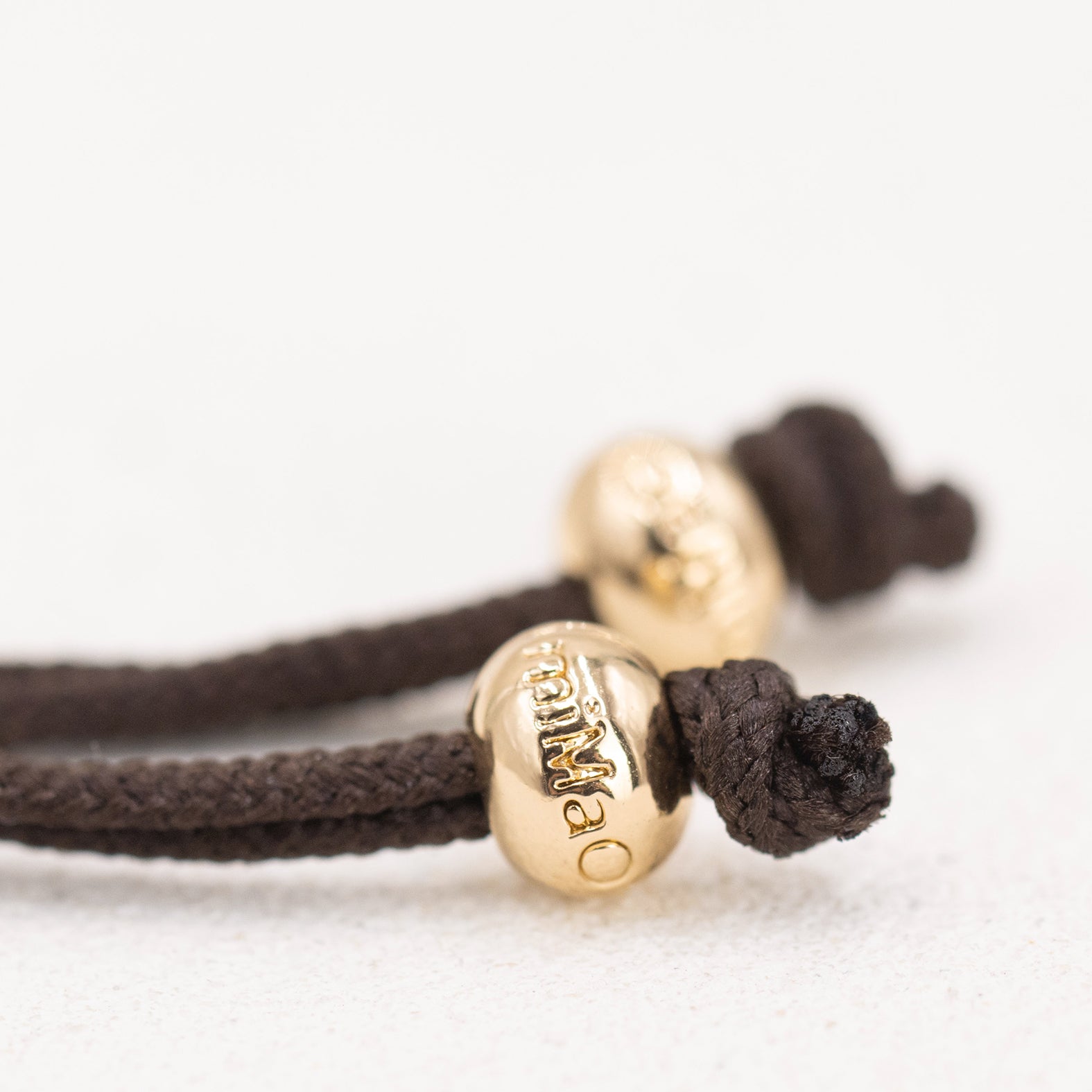 BROWN STRENGTH BRACELET GOLD