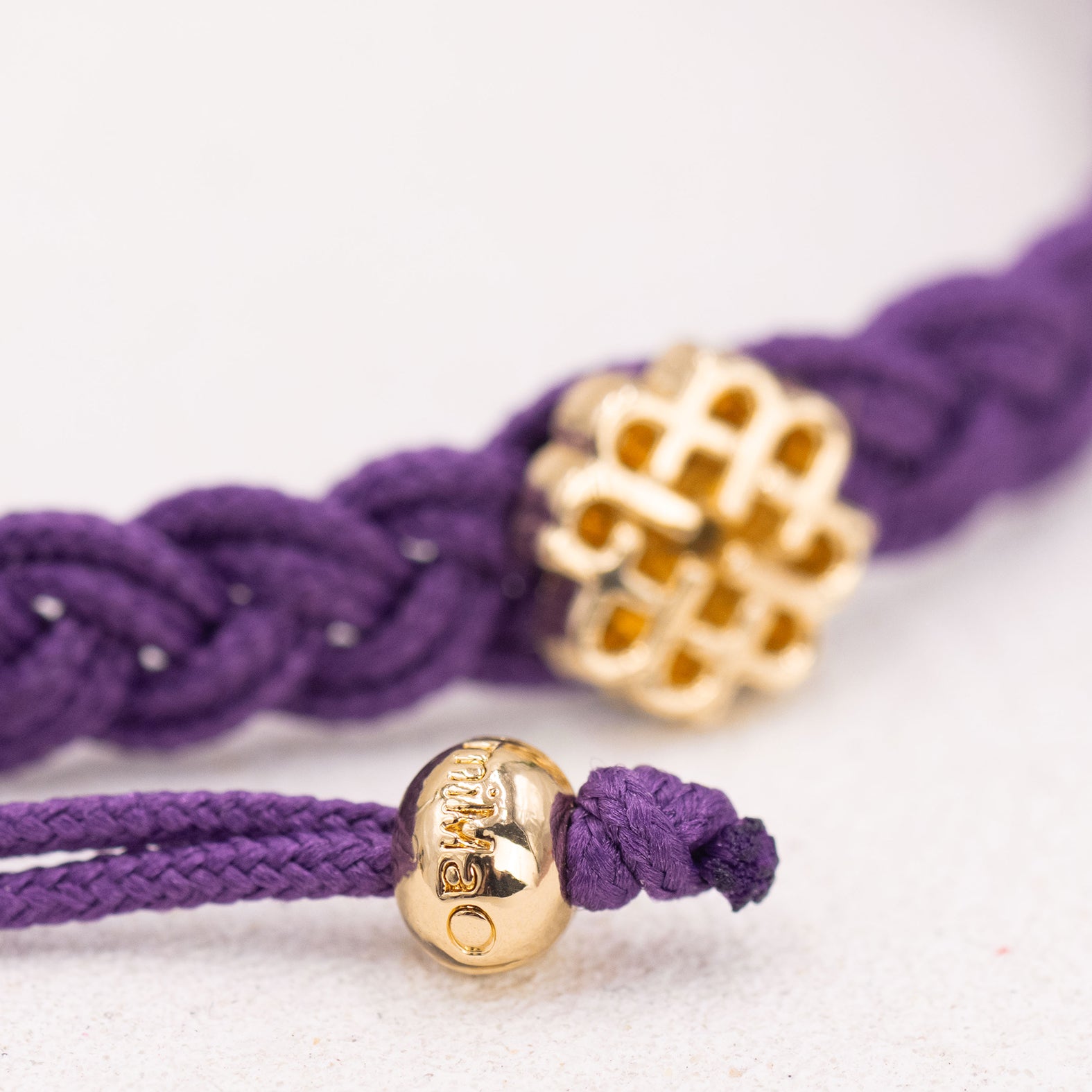 BRACELET VIOLET ET OR, SYMBOLE DE CRÉATIVITÉ