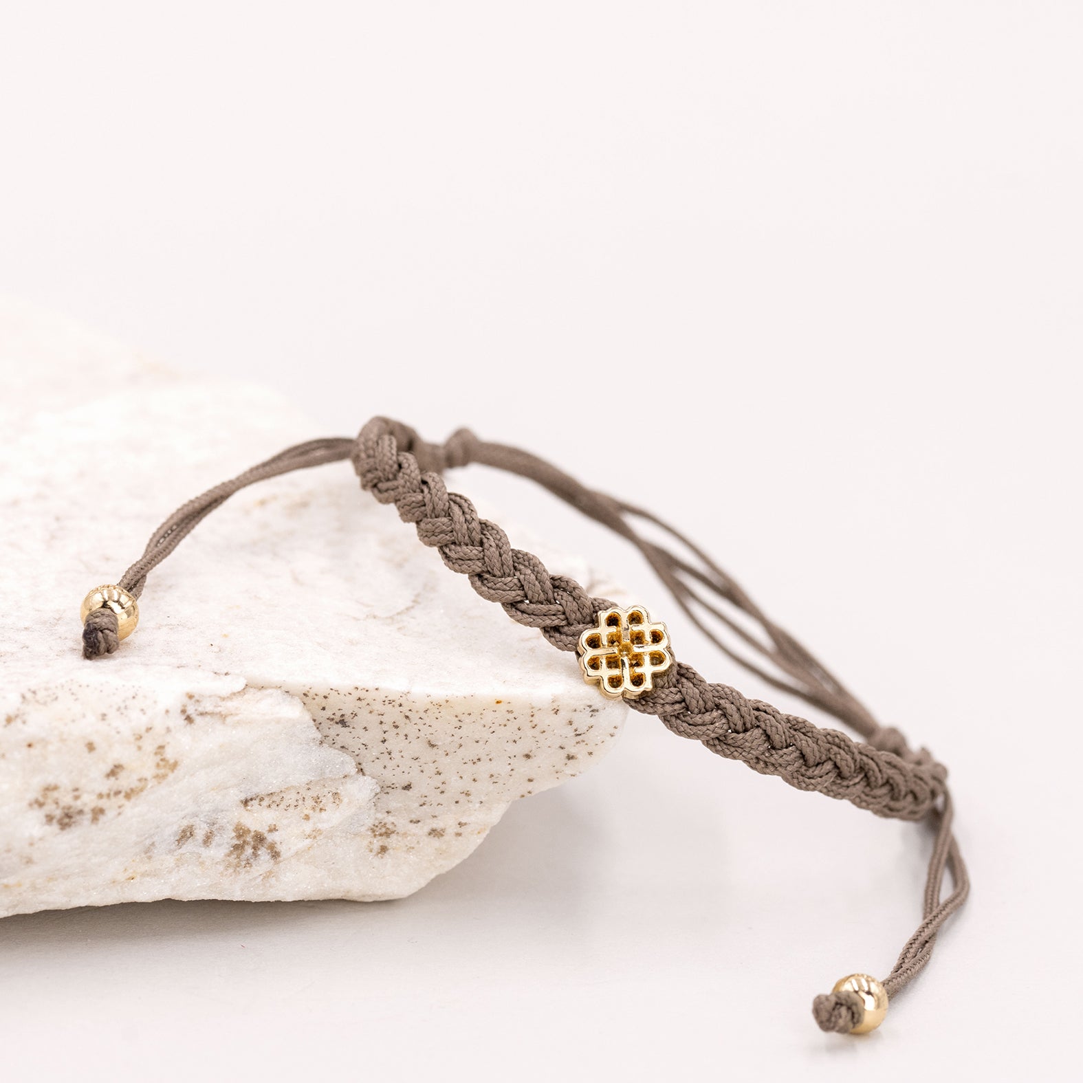 PULSERA TAUPE DEL EQUILIBRIO ORO